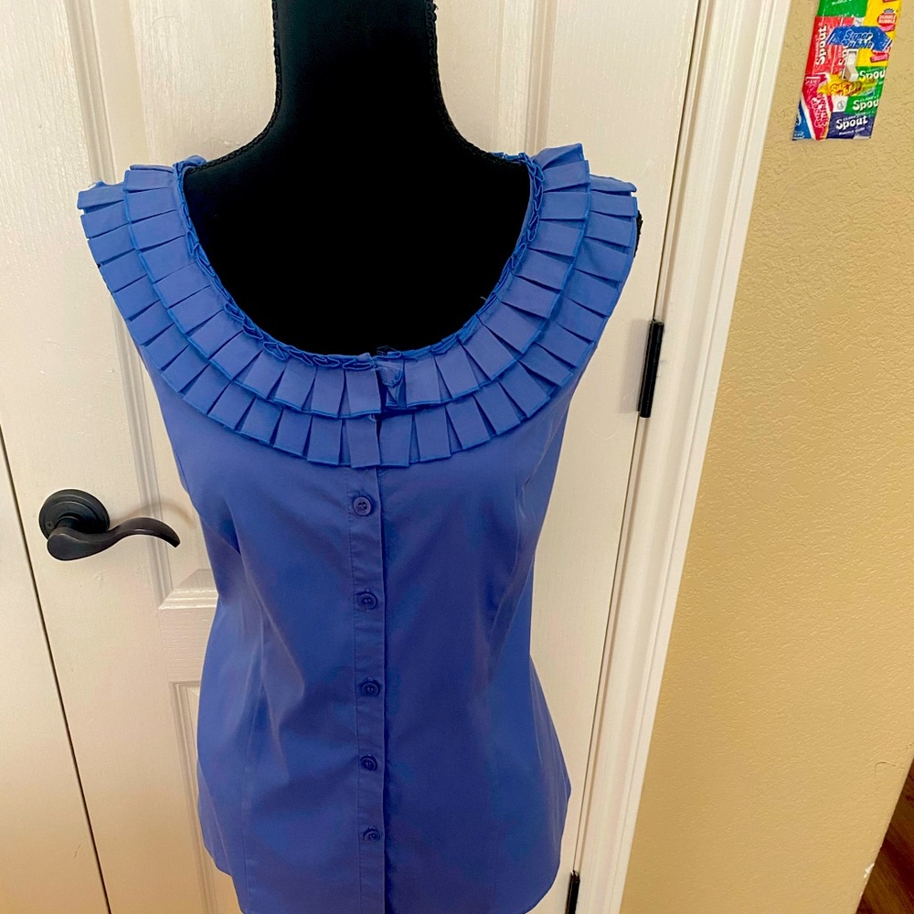 Periwinkle Sleeveless button-down with ruffled scoop neck